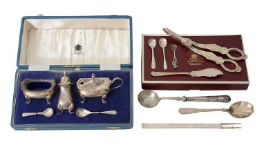 An Elizabeth II pair of silver grape shears, cased silver three piece cruet set and other silver