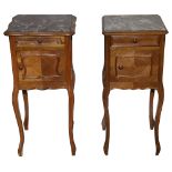 Two French rosewood bedside cabinets