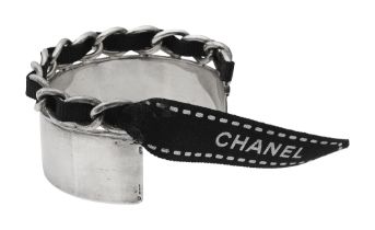 A silver cuff by Chanel
