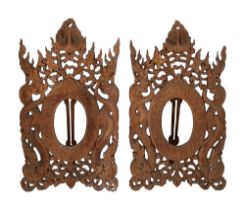 A pair of large Burmese carved teak easel back photograph frames c.1900