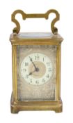 A late 19th century brass carriage clock