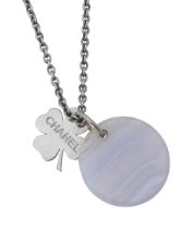 A clover and blue hardstone pendant by Chanel
