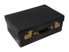 A Walker & Hall dark blue leather suitcase