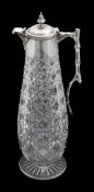 A late Victorian silver mounted cut glass claret jug
