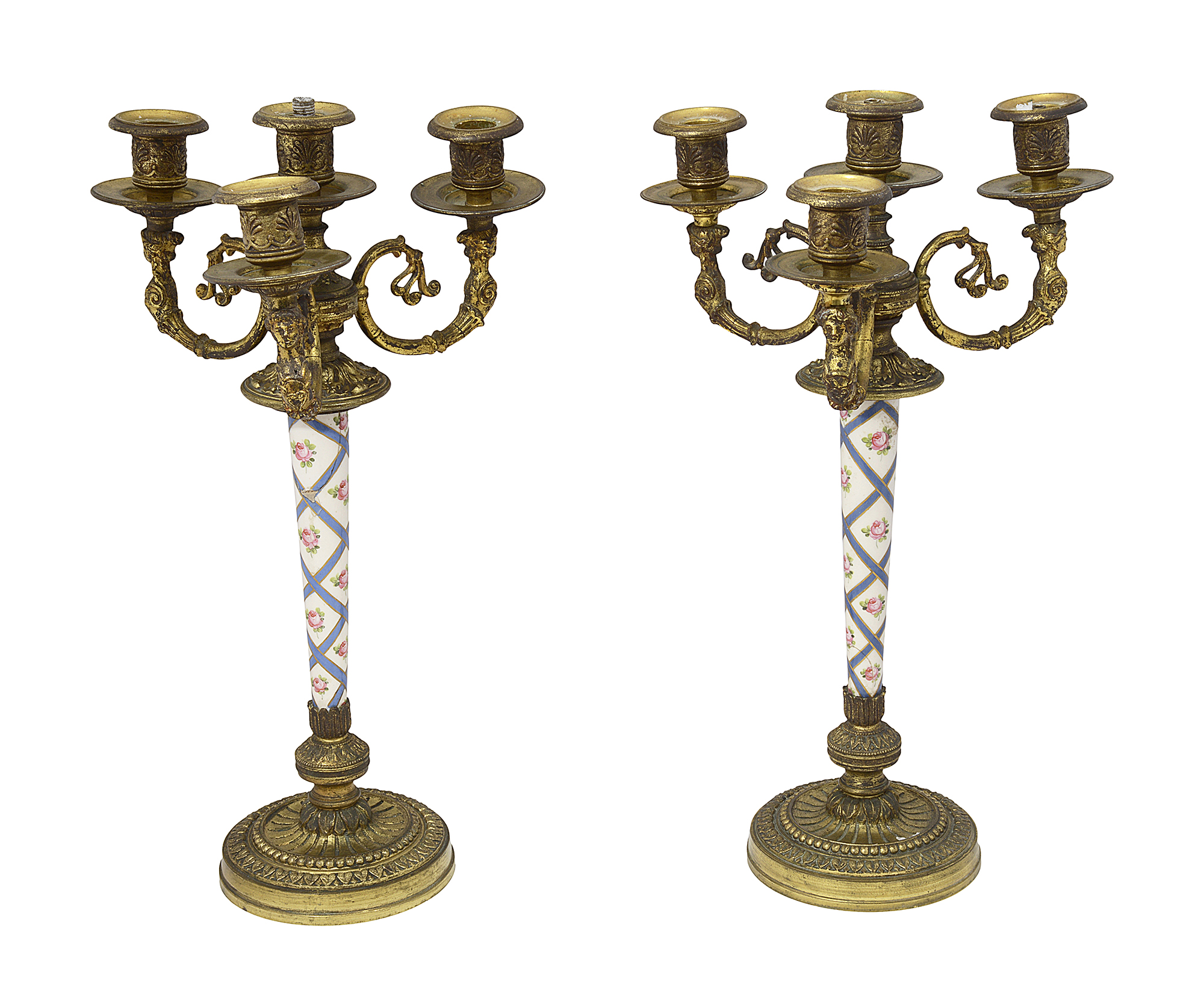 A pair of Louis XVI style gilt metal and porcelain candelabra