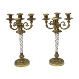 A pair of Louis XVI style gilt metal and porcelain candelabra