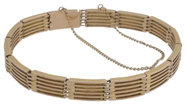 A 15ct gold six-bar gate bracelet