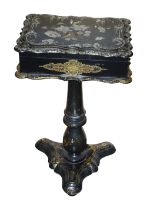A Victorian black papier mache and mother of pearl inlaid work box