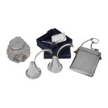 A pair of Elizabeth II silver snuffers and three silver items