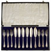 A George V set of six silver fish fork and knives