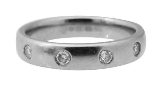 A diamond and 18ct gold band