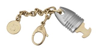 A Chanel 'Coco Market' novelty trolley coin fob