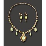 A mid Victorian peridot and yellow gold demi parure