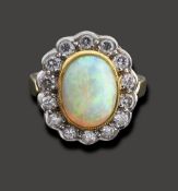 An opal and diamond-set cluster ring