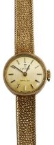 A 9ct gold lady's wristwatch by Tissot