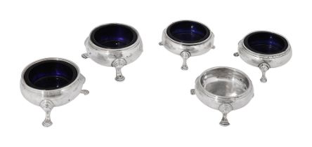 A pair of George III silver cauldron salts and three others