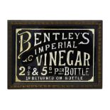 An early 20th century foiled verre eglomise advertising sign for Bentley's