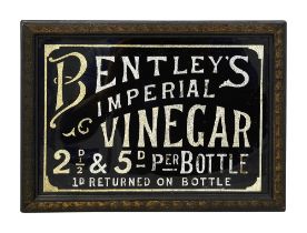 An early 20th century foiled verre eglomise advertising sign for Bentley's