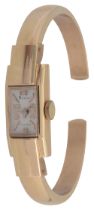 An 18ct gold Ralco manual wind bangle lady's wristwatch