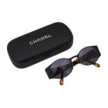 A pair of 90s Chanel sunglasses