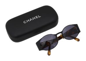A pair of 90s Chanel sunglasses