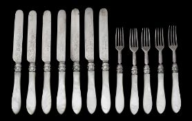 A set of twelve Victorian silver and mother of pearl dessert knives and forks