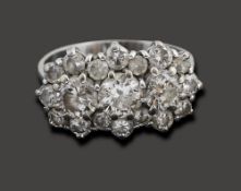A diamond-set oval cluster ring