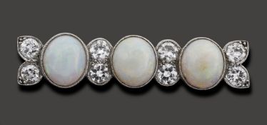An opal and diamond-set brooch