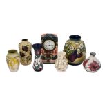 A modern Moorcroft oberon pattern clock and a collection of vases