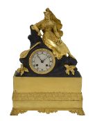 A Charles X gilt brass and metal mantel clock