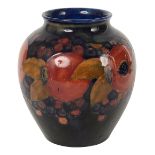 A Moorcroft pomegranate pattern vase c.1920