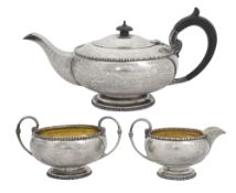 A George V silver three piece tea set