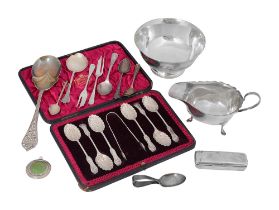 Assorted silver to include an American footed bowl and a sauce boat