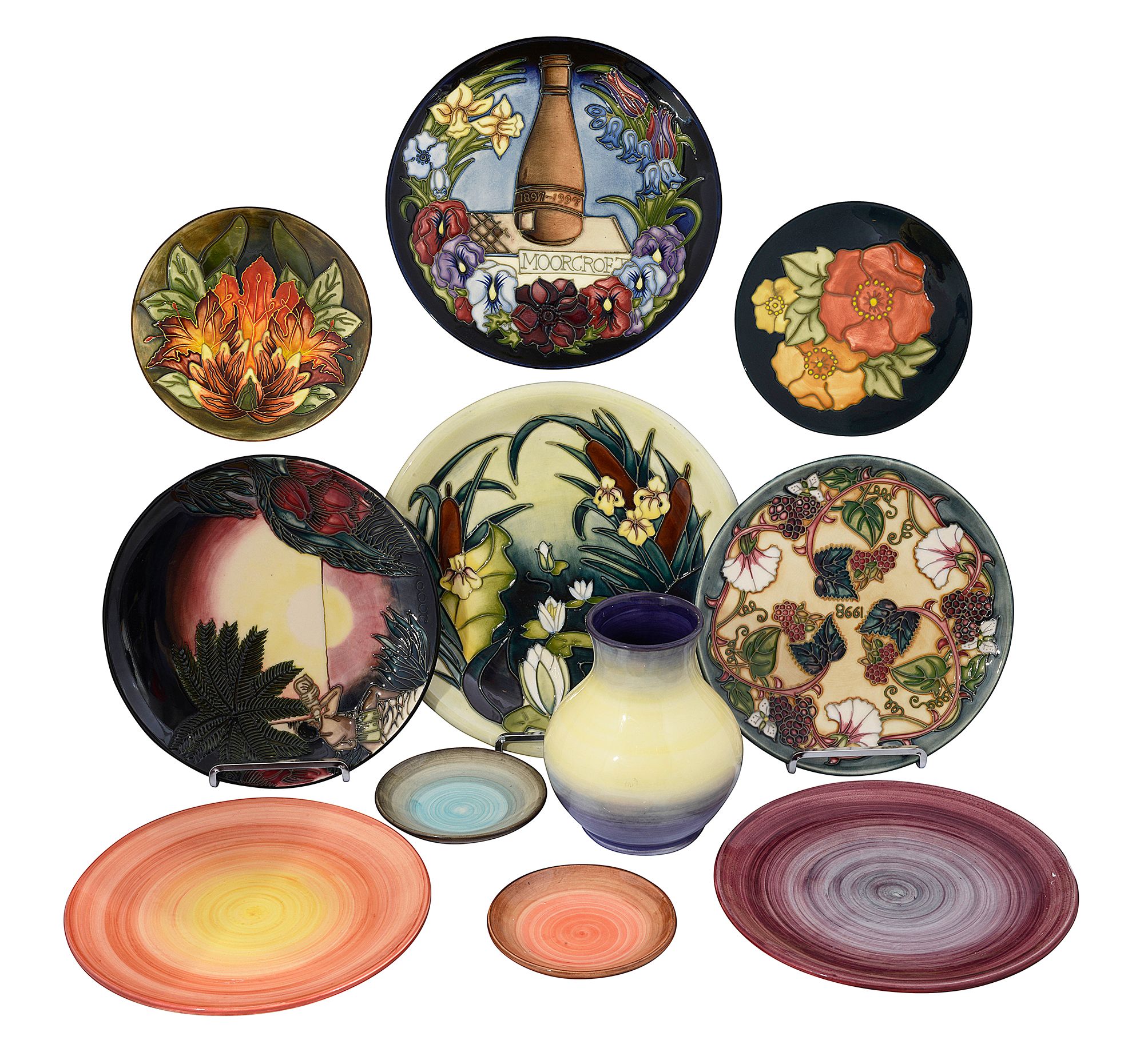 Modern Moorcroft pottery to include year plates and colour trial pieces