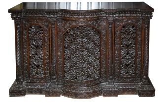 A Burmese carved rosewood side cabinet