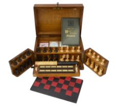 A late Victorian oak 'Royal Cabinet of Games' compendium by Leuchars & Sons