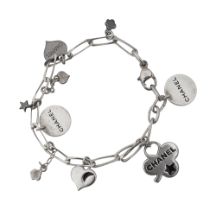 A silver charm bracelet by Chanel