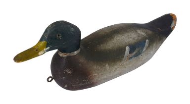 A pine and painted decoy duck