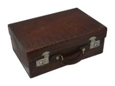 An English crocodile skin suitcase