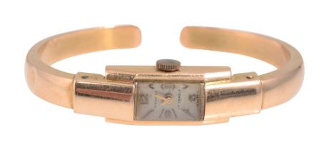 An 18ct gold Femina manual wind bangle lady's wristwatch