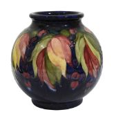 A William Moorcroft pottery Leaf and Berry Pattern globe vase c.1935