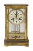 A late 19th century French gilt brass four glass mantle clock