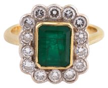 An emerald and diamond-set ring