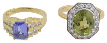A peridot and diamond ring and a tanzanite and diamond ring