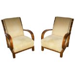 A pair of walnut and upholstered Art Deco armchairs