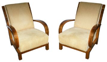 A pair of walnut and upholstered Art Deco armchairs