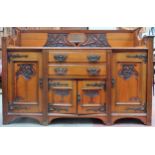 Early 20th century Arts and Crafts style mahogany carved sideboard. App. 122cm H x 184cm W x 60cm