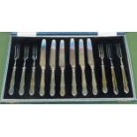 Cased set of six hallmarked silver handled knives and forks All in used condition