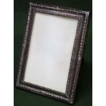 Small hallmarked silver photo frame, Birmingham assay. App. 17 x 13cm Appears in reasonable used