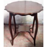 20th century wave edged two tier parlour table. App. 71cm H x 64cm Diameter Used condition, scuffs